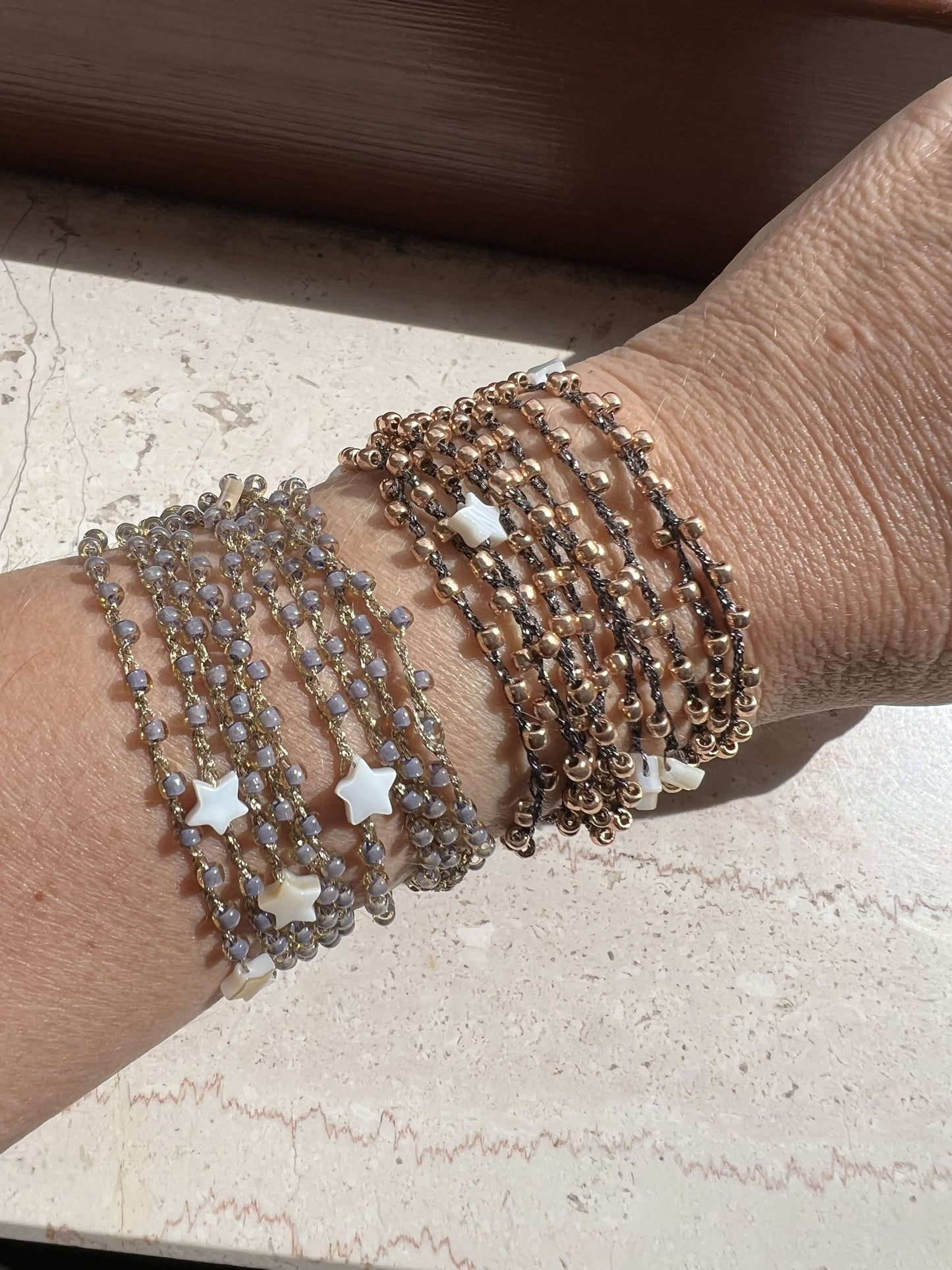 Collane estive lunge multifilo donna con perline giapponesi e stelle madreperla, look boho chic elegante