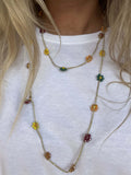 Collana boho handmade Fioronda con fiori autunnali. Regolabile, analergica e senza metallo: un gioiello artigianale unico.