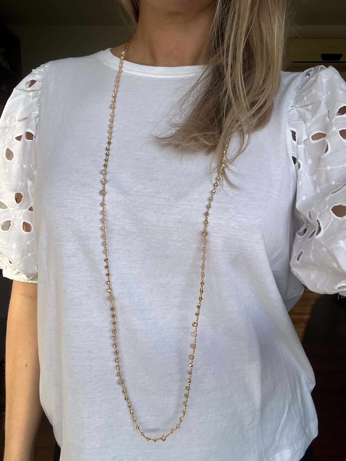 Collana boho artigianale Soleil Bloom: doppio filo di cristalli oro e doré, raffinata, leggera e naturale