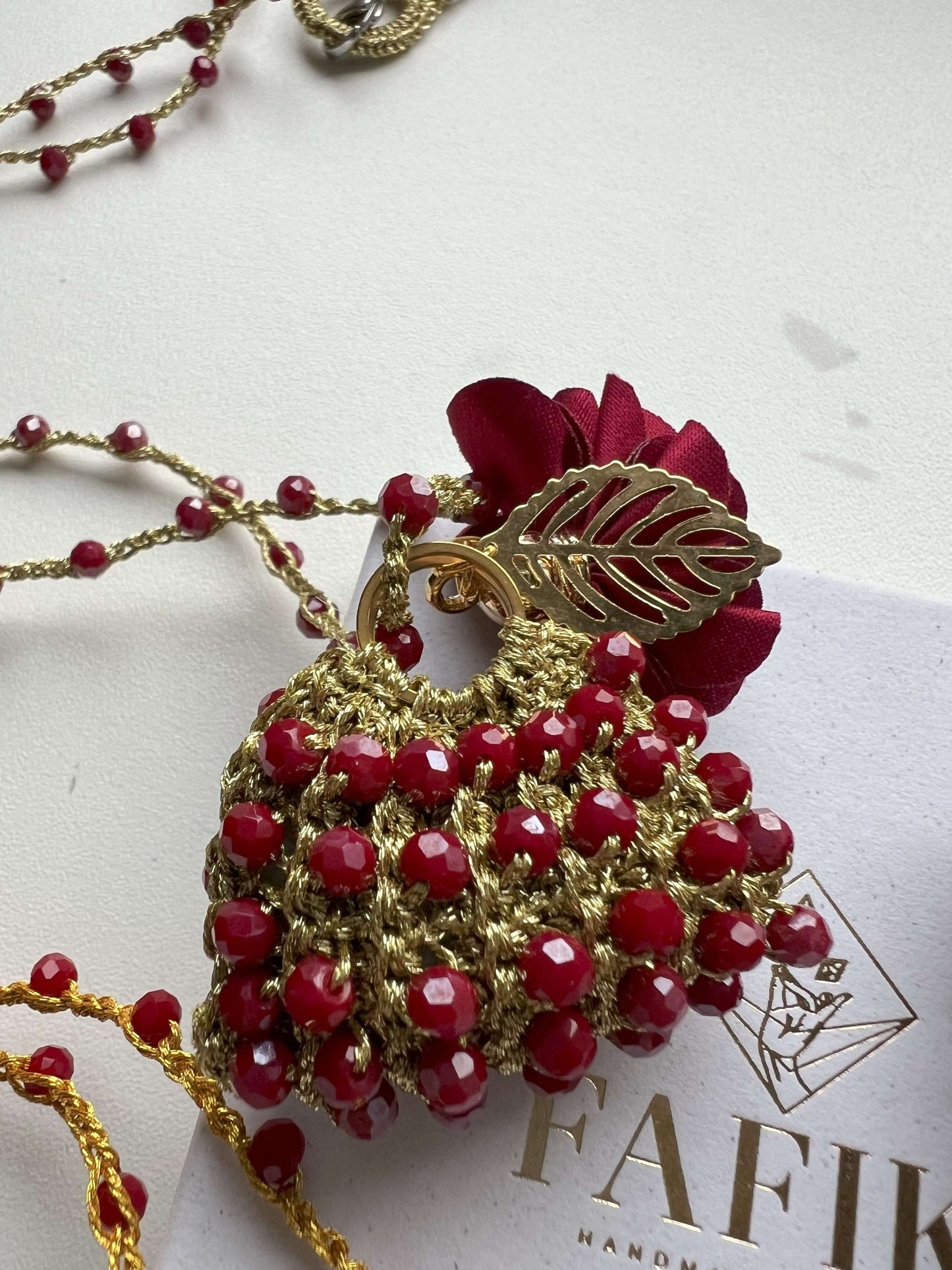 Handmade mini bag pendant necklace with red wine crystals and floral charms