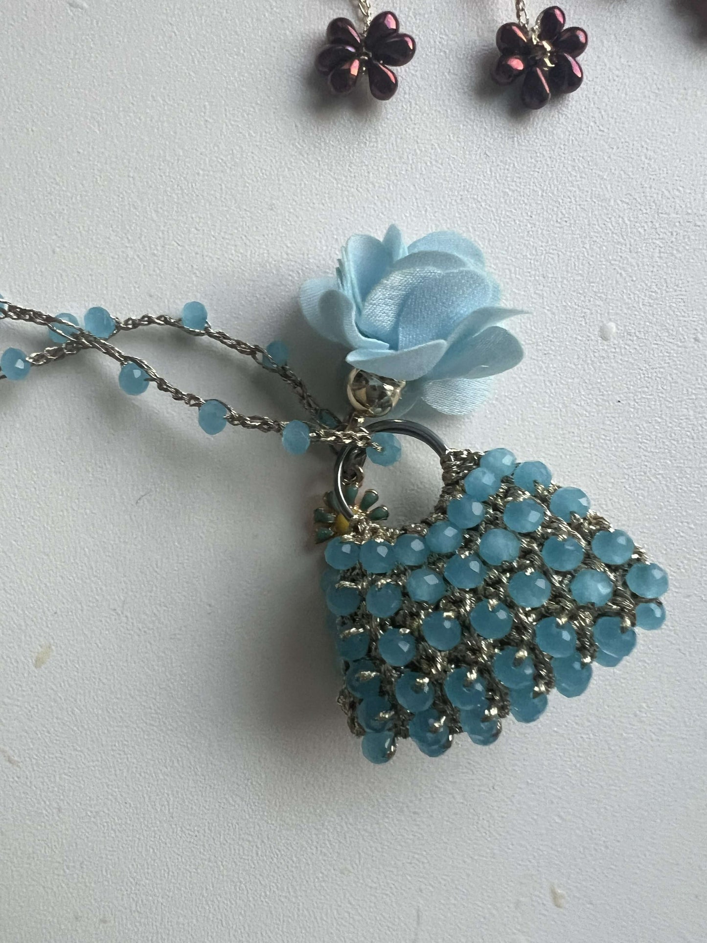 Handmade mini bag pendant necklace with celeste crystals and floral charms – perfect gift for women who have everything