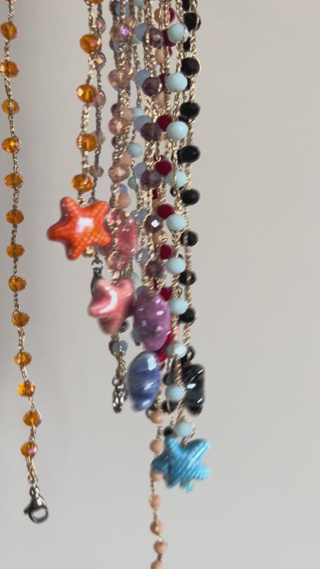 Prima Stella wrap necklace available colors orange black pink sky blue purple