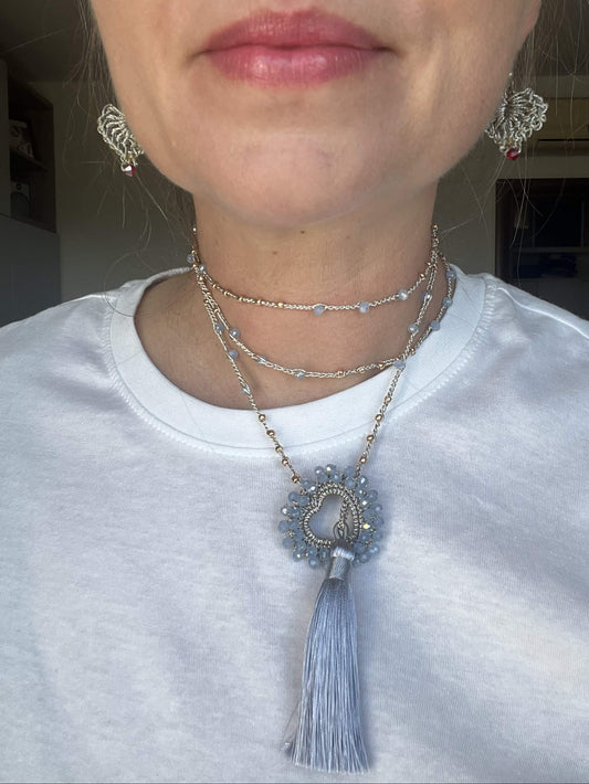 Blue Sky Heart necklace with sky blue crystals and gold beads, elegant minimalist jewelry for everyday feminine style