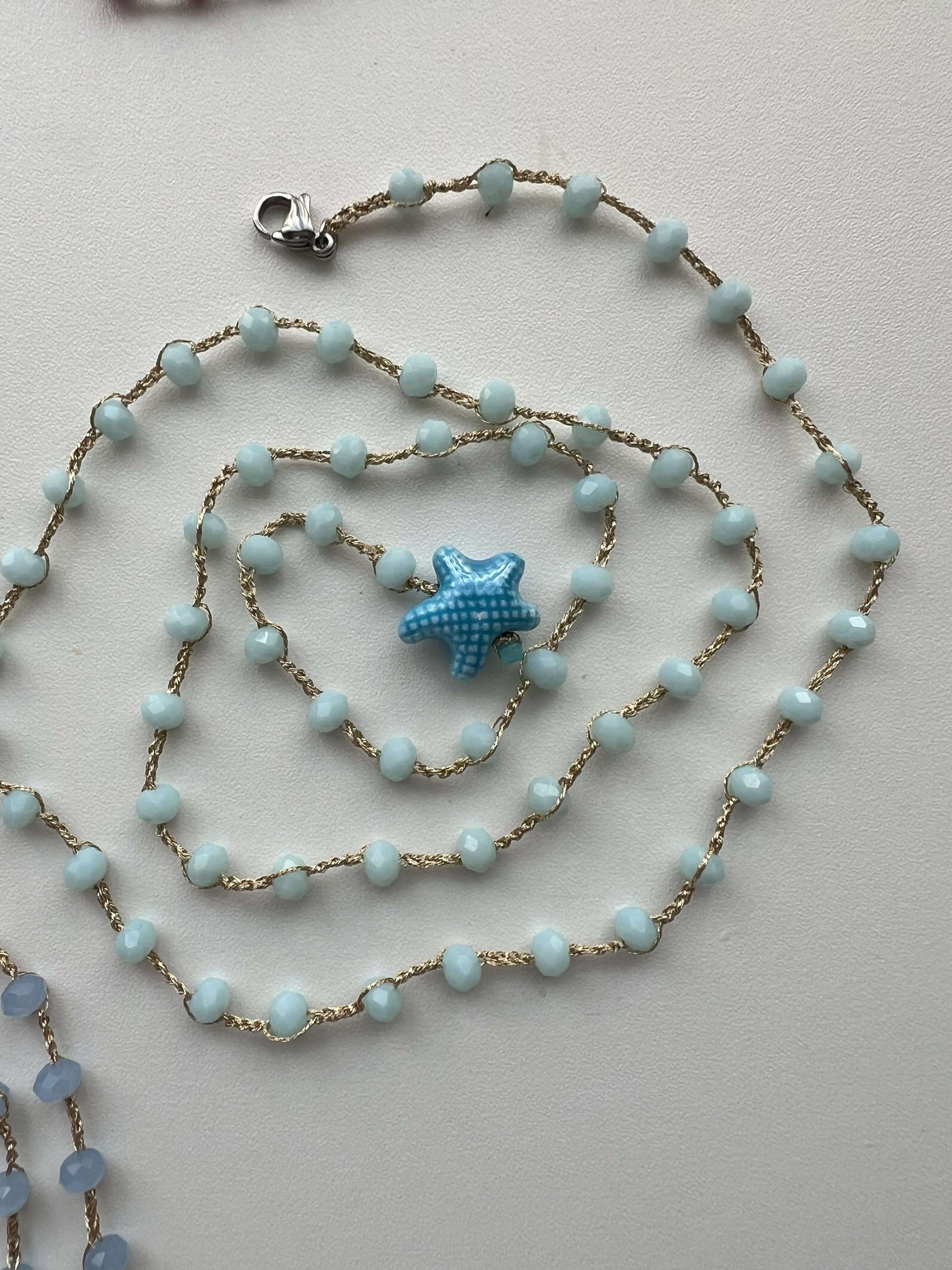Gioiello boho celeste, stella ceramica e cristalli. Indossalo a uno o due giri o avvolto al polso.