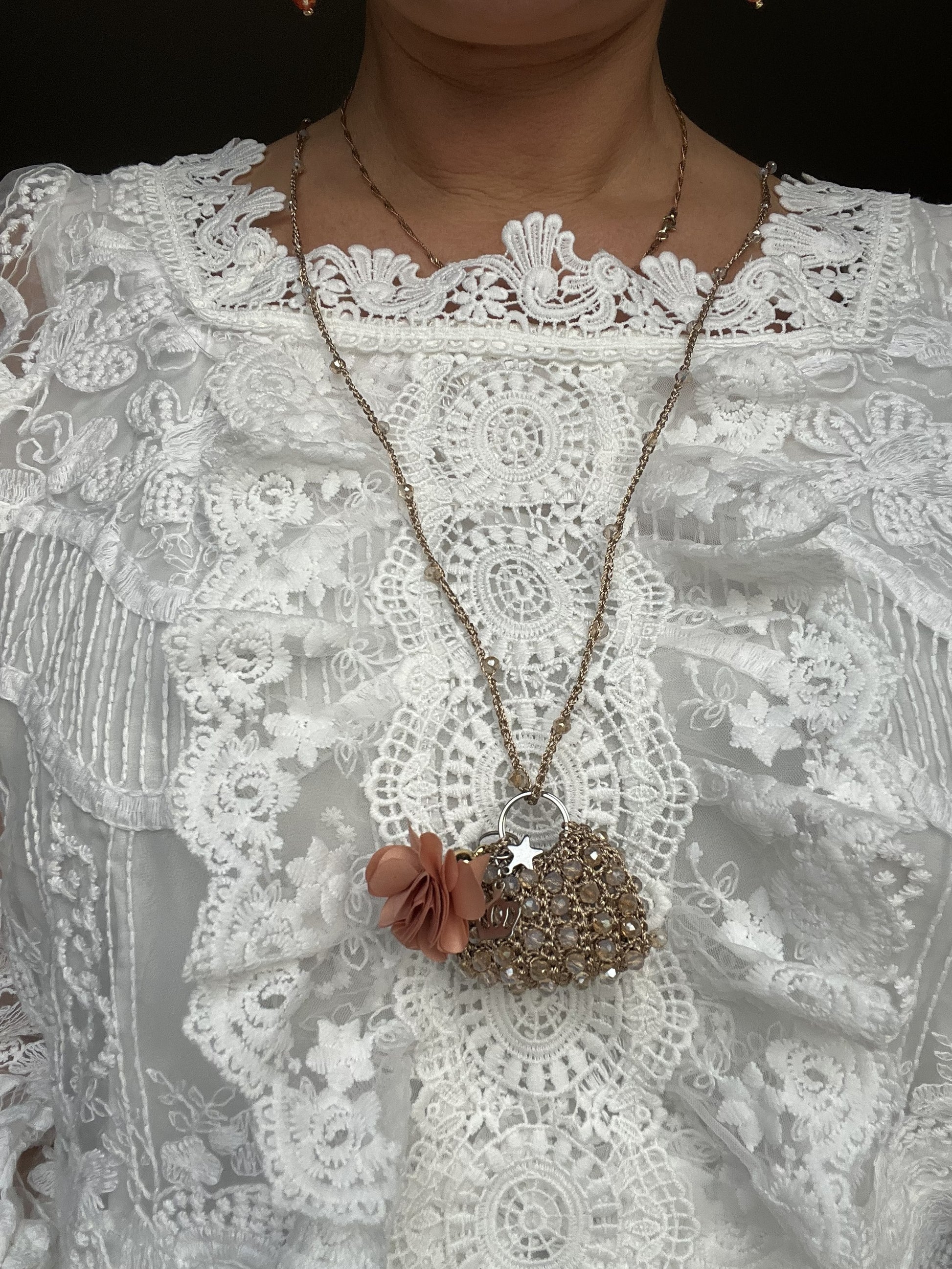 oman wearing mini bag crystal necklace statement gift elegant style beige